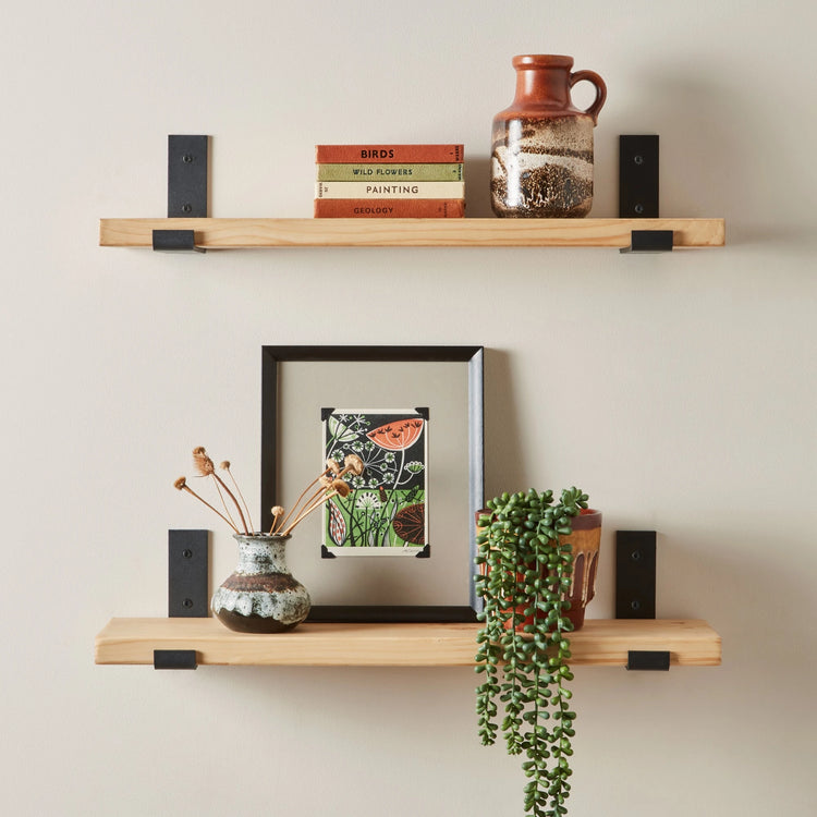 Toddler bed from Roomix with sturdy wooden frame and soft finish, designed for safe and cozy kids' bedrooms