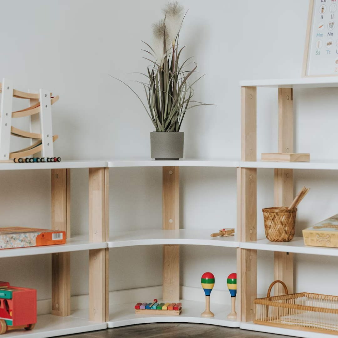 Montessori corner shelves with colorful educational toys arranged neatly, supporting simple, accessible organization