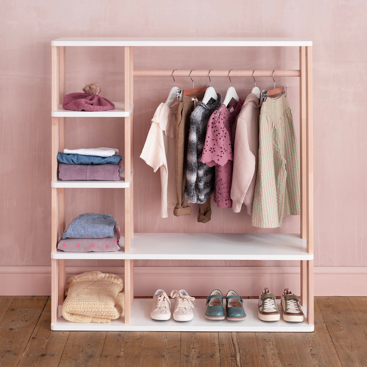 Spacious Roomix kids wardrobe shelf with organized storage, perfect for children's clothes and toys