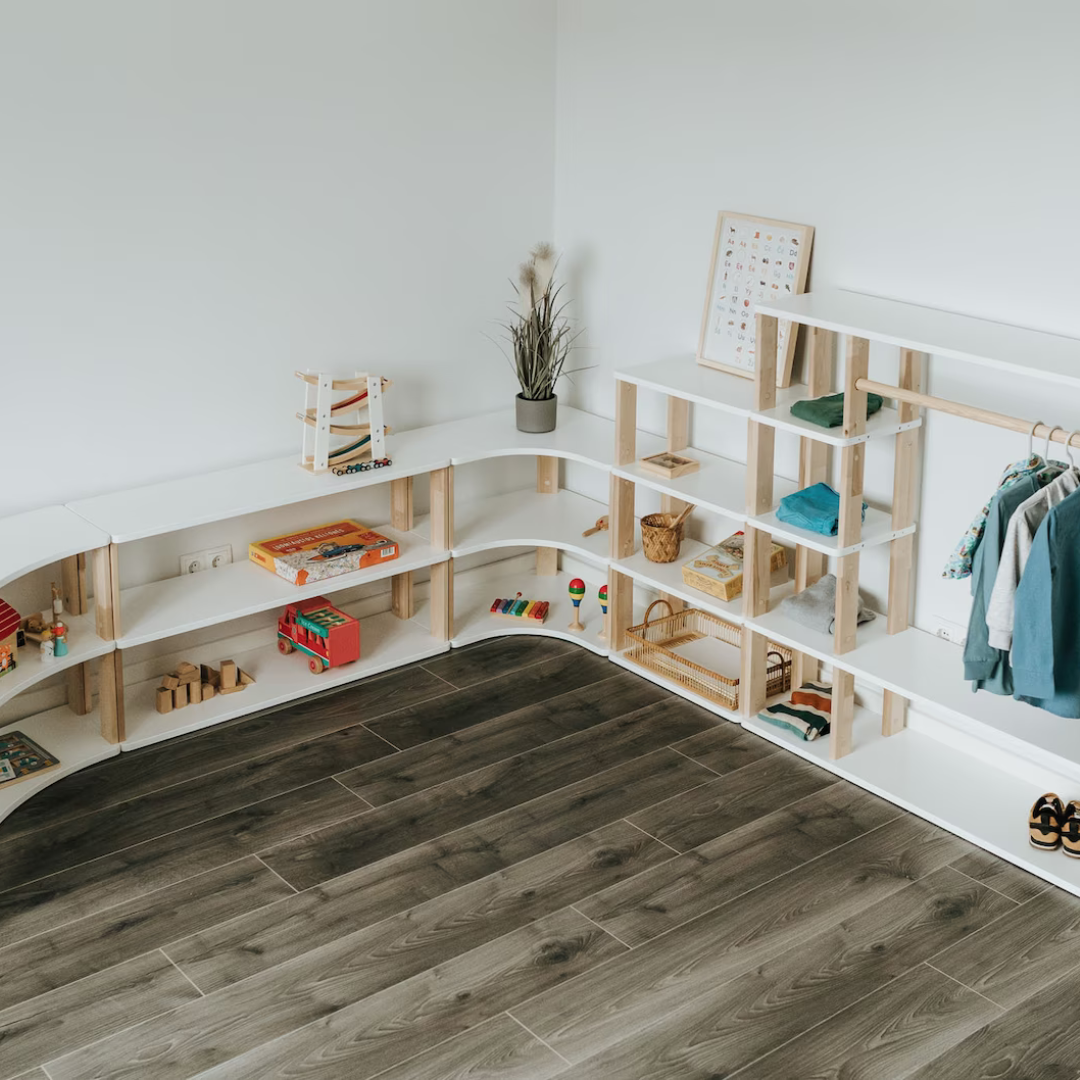 Roomix Montessori shelves in a child’s play area, emphasizing clean lines and safe materials for family peace of mind