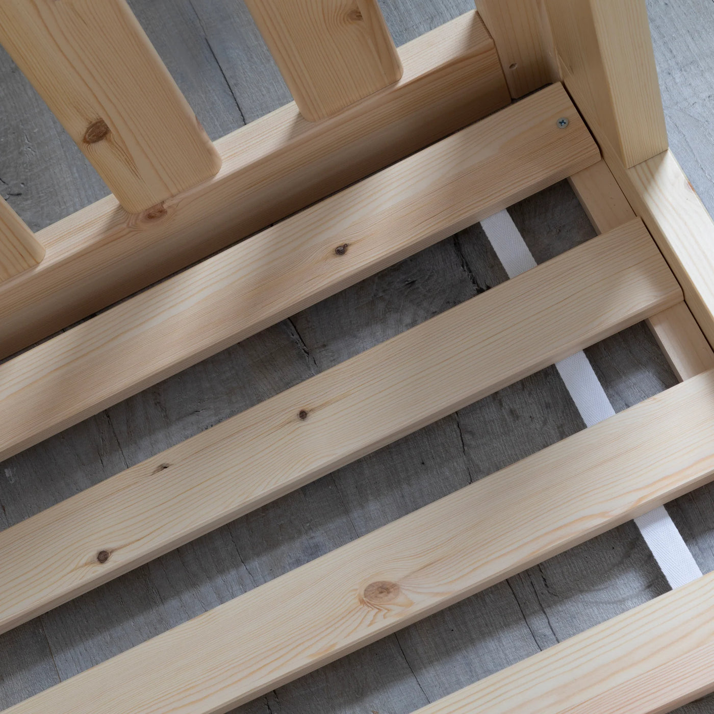 when to transition from cot to bed