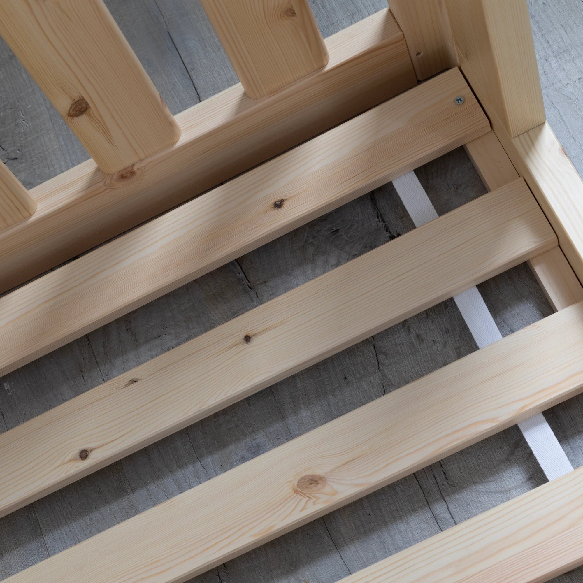 when to transition from cot to bed